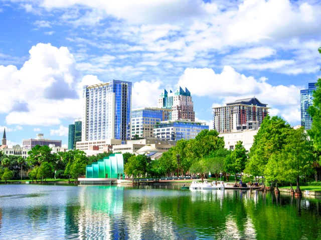 Lake lined with high rises in Orlando, Florida
