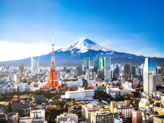 Tokyo SkyTree towering above the city skyline with Mount Fuji in background