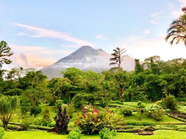 Forest shrouding view of Arenal volcano in Costa Rica