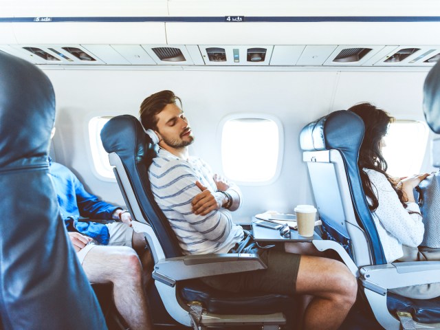 Passenger dozing off on airplane