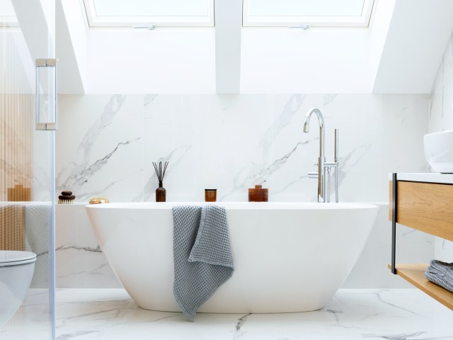 Hotel room bathtub under skylight