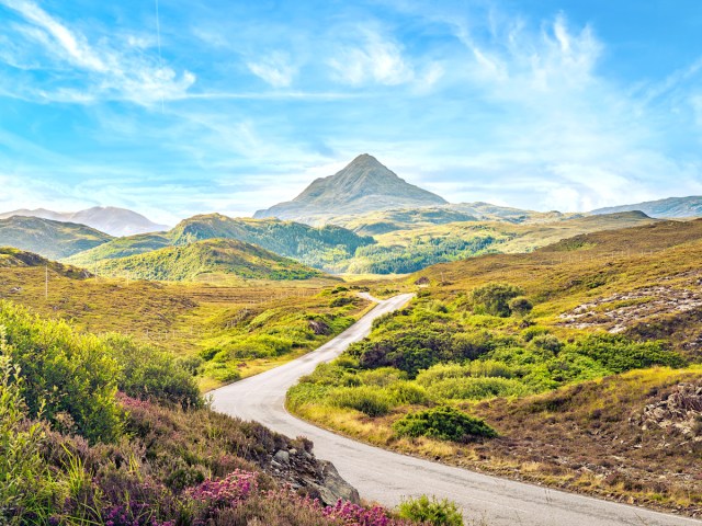 Road leading toward Ben Stack mountain in the Scottish Highlands