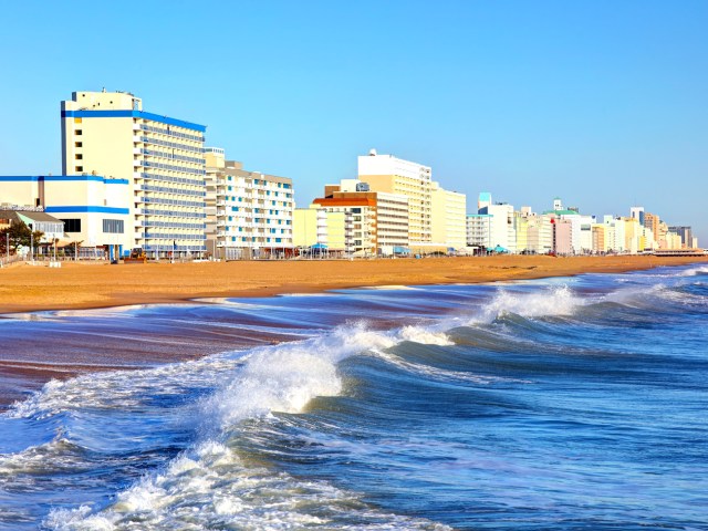 Waves crashing beside Virginia Beach boardwalk