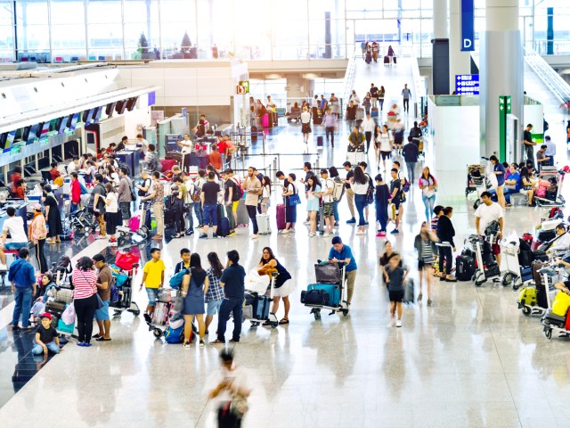 Busy airport terminal, seen from above