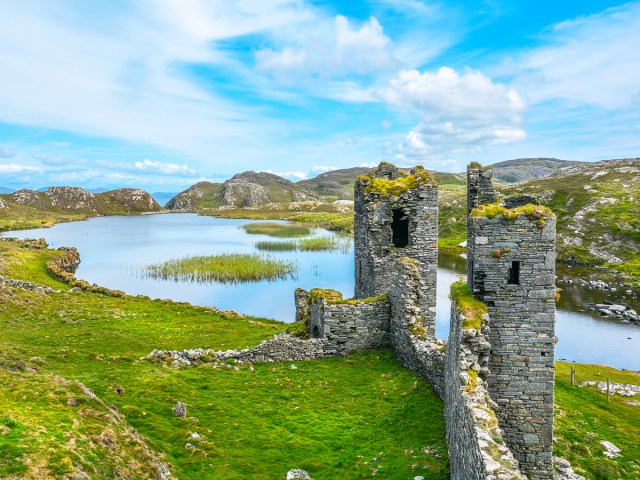 Castle ruins beside lake in Cork, Ireland