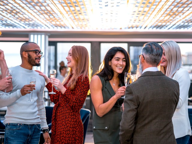 Hotel guests enjoying happy hour