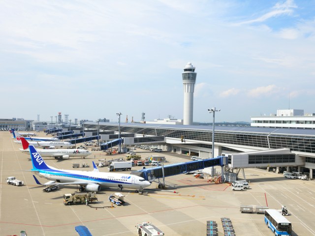 Aircraft parked at boarding gates at Nagoya Chubu Airport in Japan