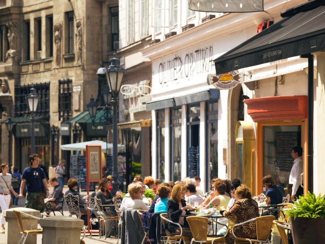 Diners at sidewalk cafes in Budapest, Hungary