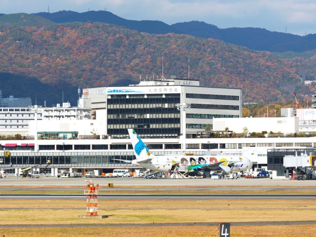 Terminal with mountains in background at Osaka's Itami Airport