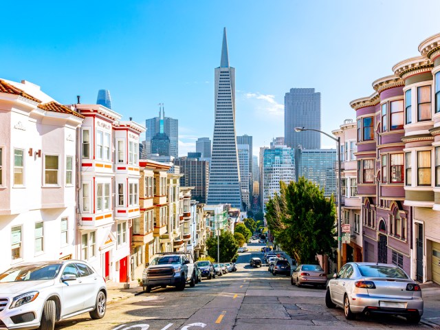 Street lined with homes facing downtown San Francisco, California