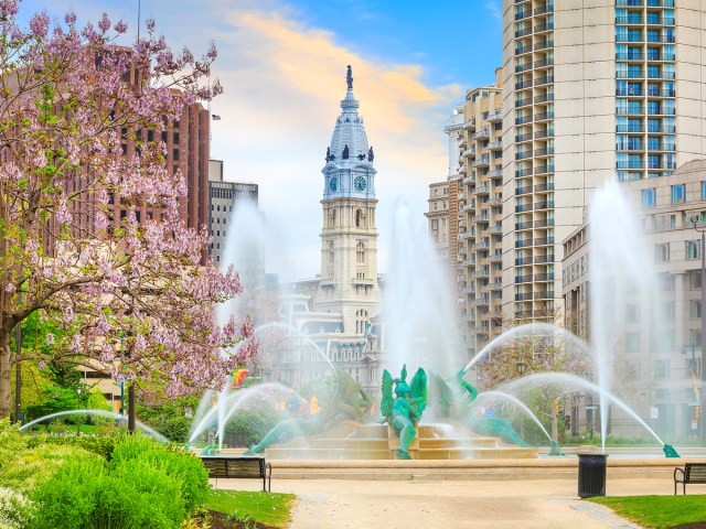 Fountain in park with Philadelphia City Hall behind