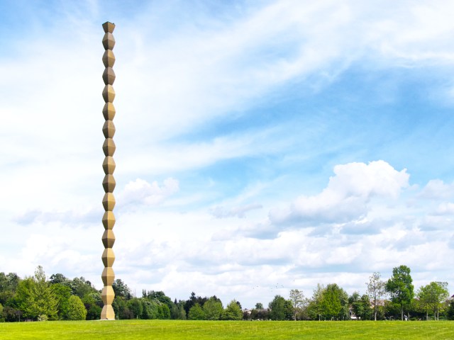 Sculpture on grassy field, forming part of Brâncuși Monumental Ensemble of Târgu Jiu in Romania