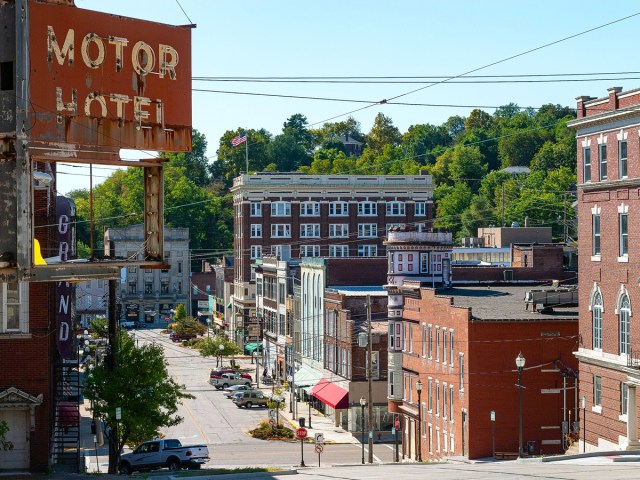 Main thoroughfare lined with buildings in Alton, Illinois