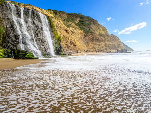 Beachfront waterfall in Point Reyes National Seashore, California