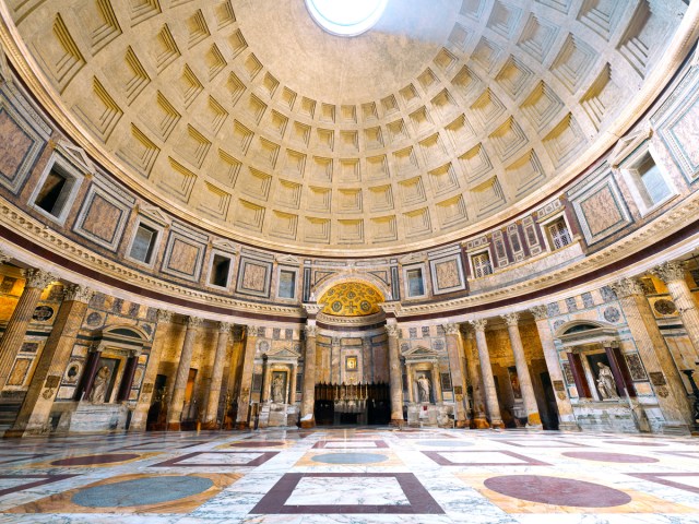 Light-filled domed interior of the Pantheon in Rome, Italy