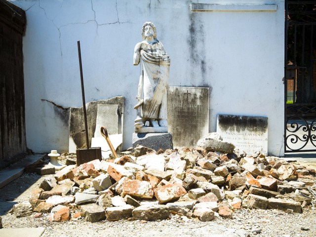 Shattered stones at burial site at St. Louis Cemetery No. 1 in New Orleans, Louisiana