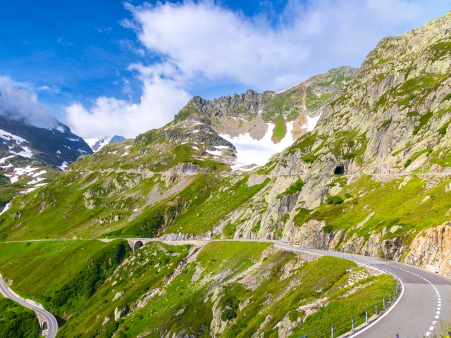 Mountain road winding through the Swiss Alps