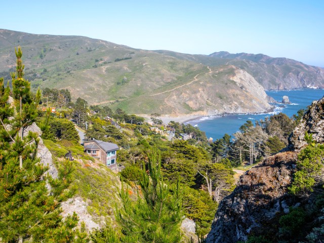 Homes in hills along coast of Marin County, California, seen from above