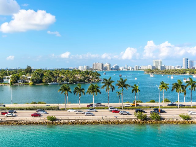 Cars on causeway from Miami to Star, Palm, and Hibiscus Islands in South Florida