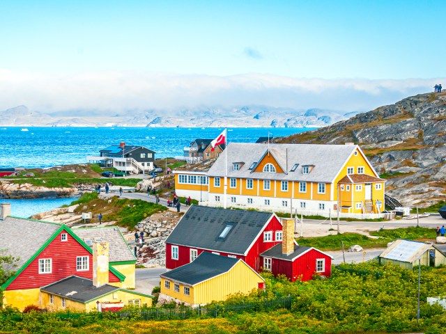 Homes on rocky coast of Greenland