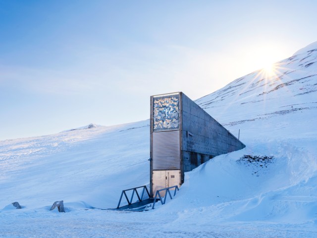 Entrance to Svalbard Global Seed Vault on snow-covered hillside in Norway