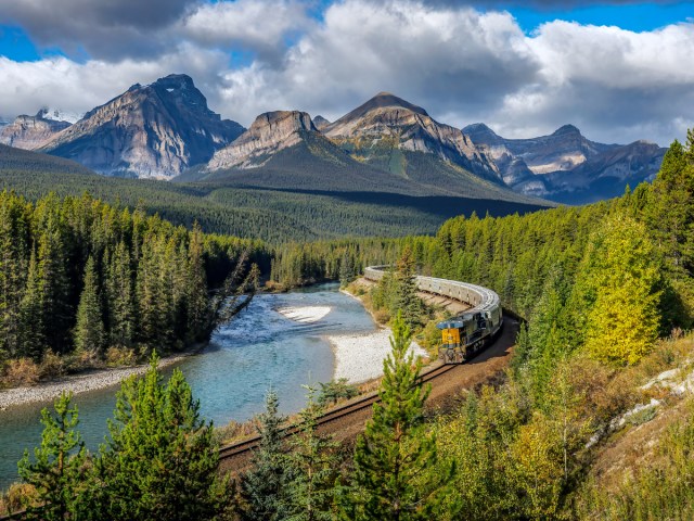 Train traveling through Rocky Mountains in Banff, Canada