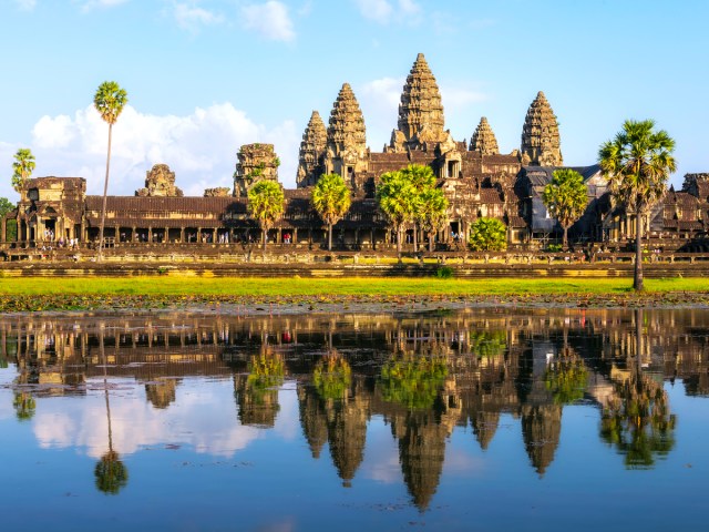 Temple complex of Angkor Wat with reflection on water in Cambodia