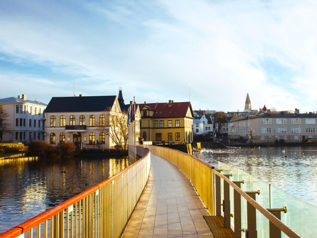 Pedestrian bridge over Tjörnin pond in Reykjavik, Iceland 