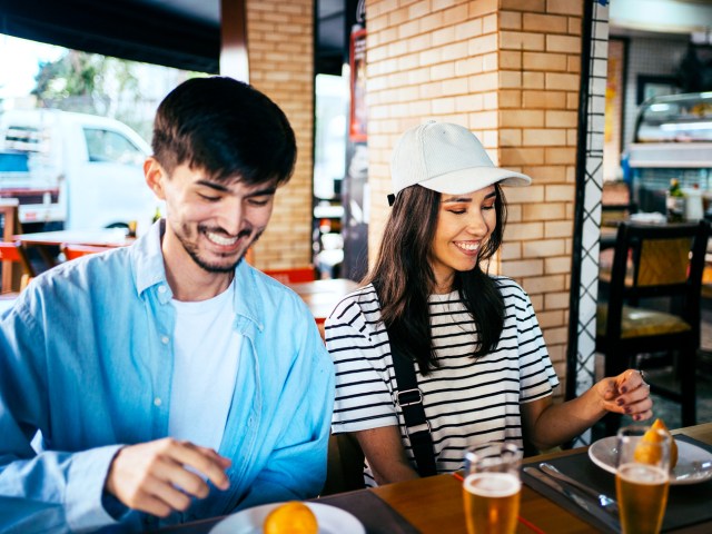 Couple eating at restaurant