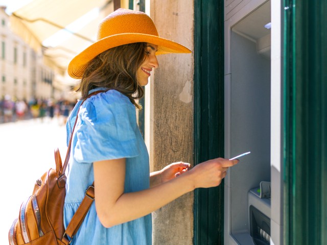 Traveler using ATM