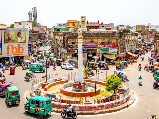 Aerial view of busy traffic circle in Delhi, India