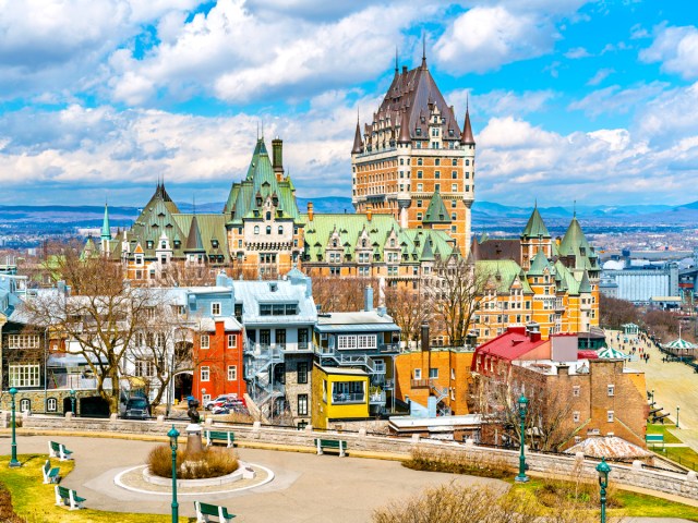 Le Château Frontenac towering above skyline of Quebec City, Canada