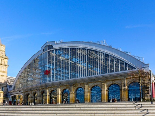 Soaring glass facade of Liverpool Lime Street Station in Liverpool, England