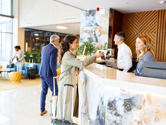 Hotel guests at check-in