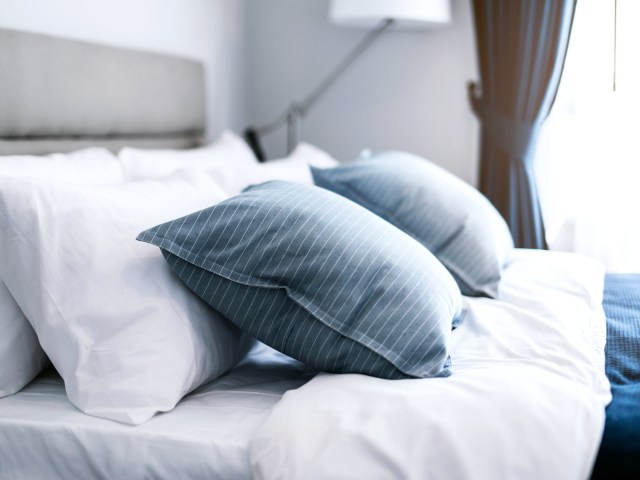 Pillows on hotel room bed