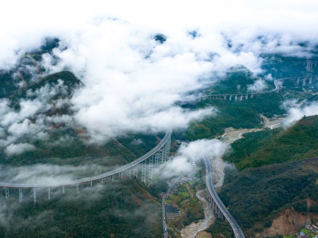 Aerial view of Yaxi Highway in China shrouded in clouds