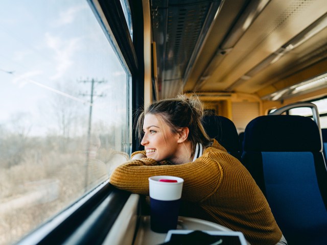 Train passenger looking out window