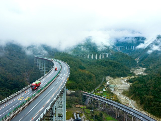 Aerial view of Yaxi Highway in China shrouded in clouds