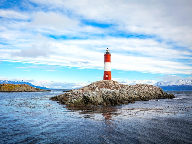 Les Eclaireurs Lighthouse on rocky outcrop in Ushuaia, Argentina