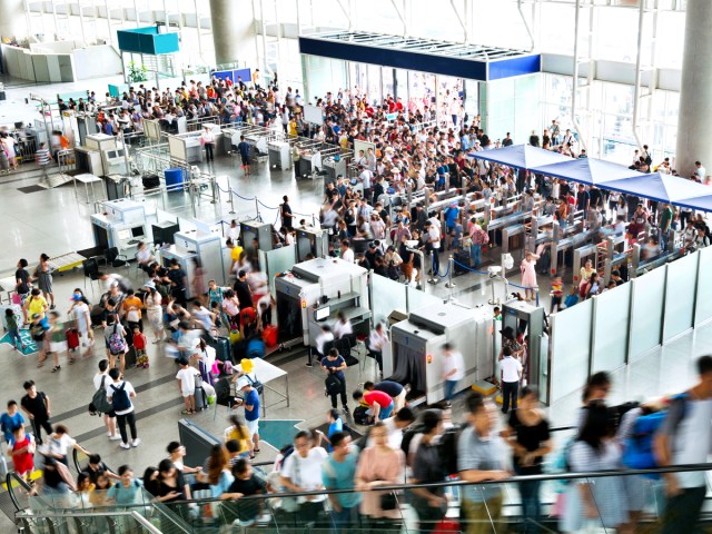 Busy airport security lines, seen from above