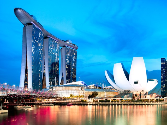 Marina Bay Sands Hotel in Singapore, seen at night from across bay