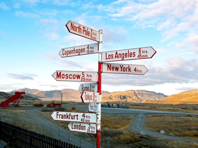 Direction sign with distances to major cities at Nuuk Airport in Greenland