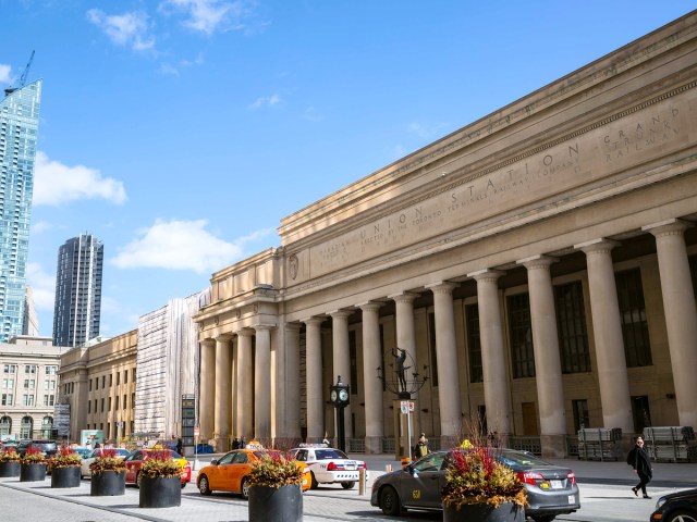 Cars driving past Toronto Union Station in Ontario, Canada