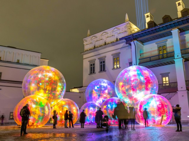 Onlookers admiring exhibits at the Vilnius Light Festival in Vilnius, Lithuania