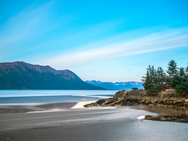 Sandy beach and mountains along the Cook Inlet, Alaska