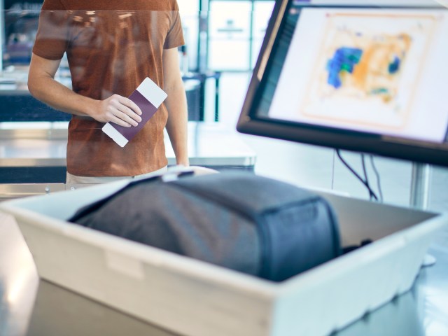 Close-up view of backpack in security bin