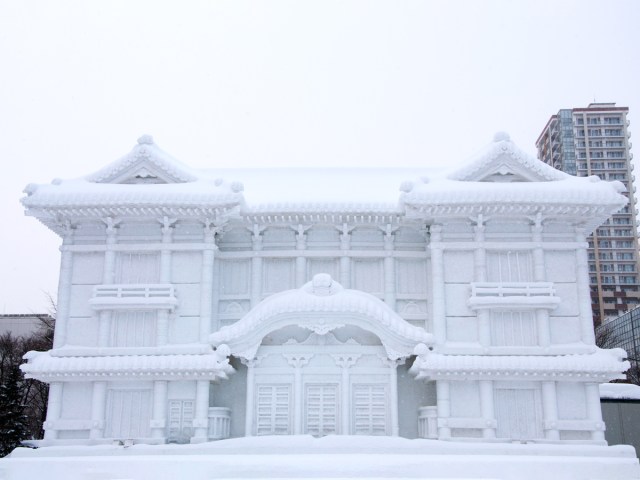 Ice sculpture of traditional building at Sapporo Snow Festival in Japan