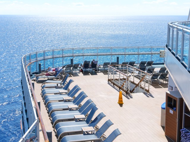 Lounge chairs on deck of cruise ship