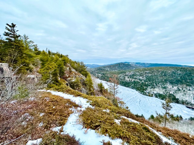 Landscape of Maine's Acadia National Park dusted with snow