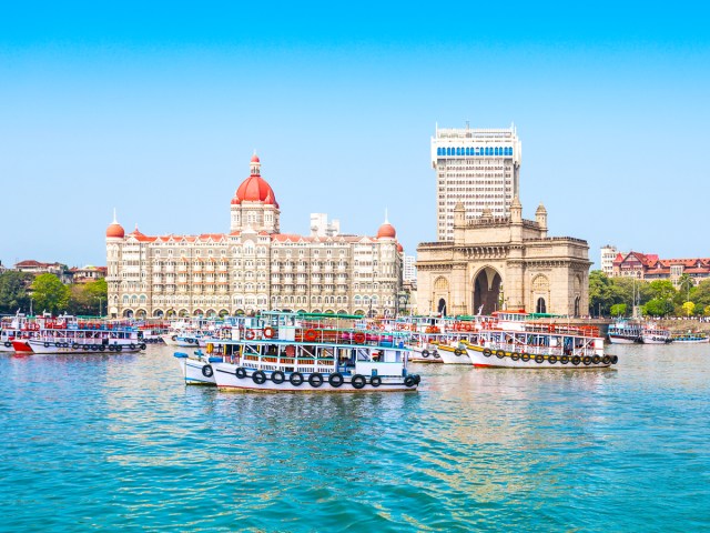 Boats in Mumbai Harbour with the Gateway of India in background